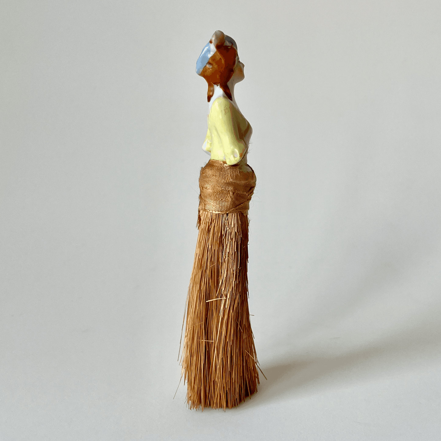 Vintage Figural Whisk Broom with Glazed Ceramic Half-Doll detail 3
